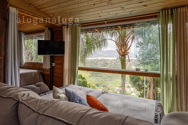 Casa de Vidro com Vista Deslumbrante