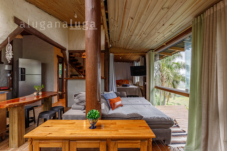Casa de Vidro com Vista Deslumbrante
