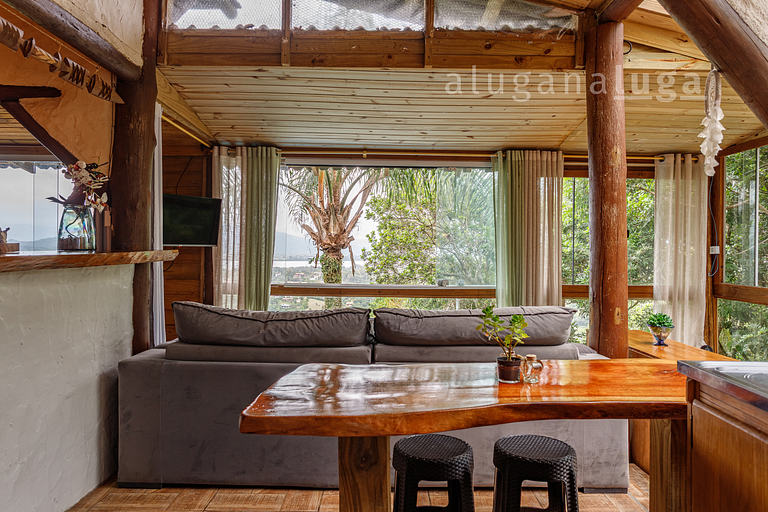 Casa de Vidro com Vista Deslumbrante